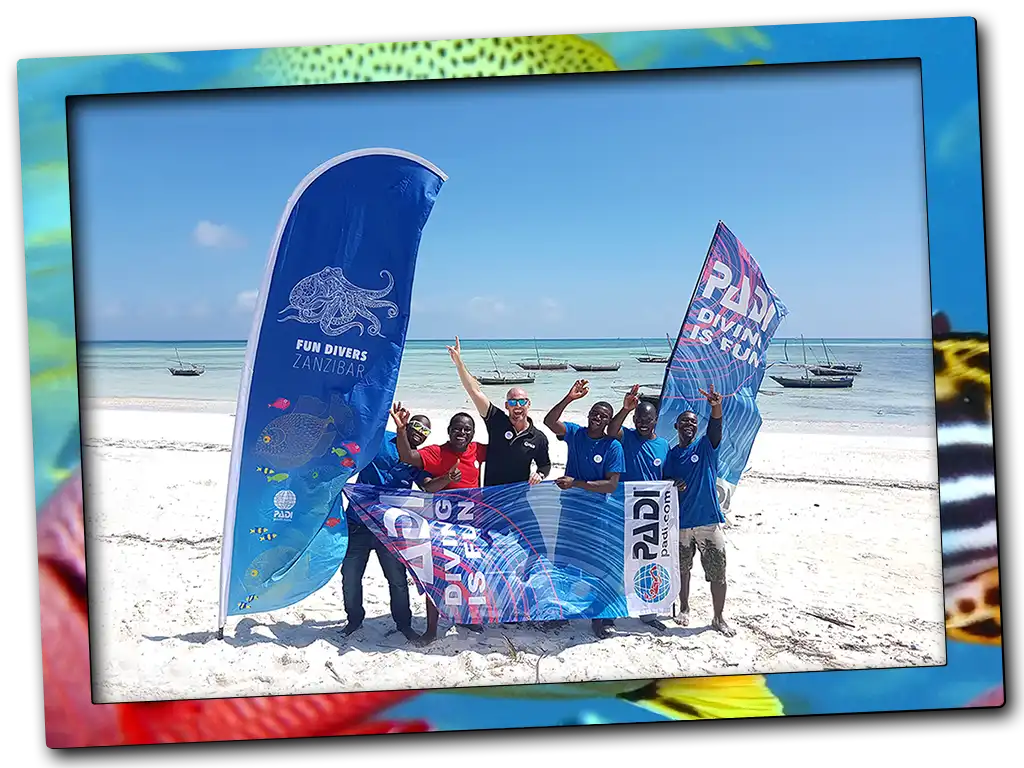 Fun Divers Zanzibar and PADI management celebrating on Nungwi Beach
